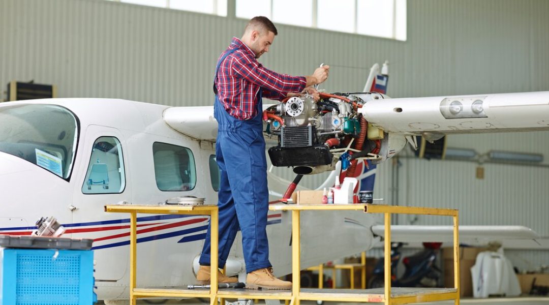 engineer-working-with-airplane_1098-12542